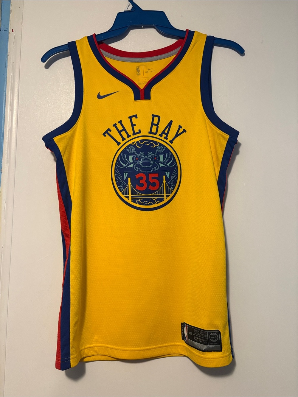 Nike Yellow 'The Bay' Kids Basketball Jersey with Navy & Red Trim